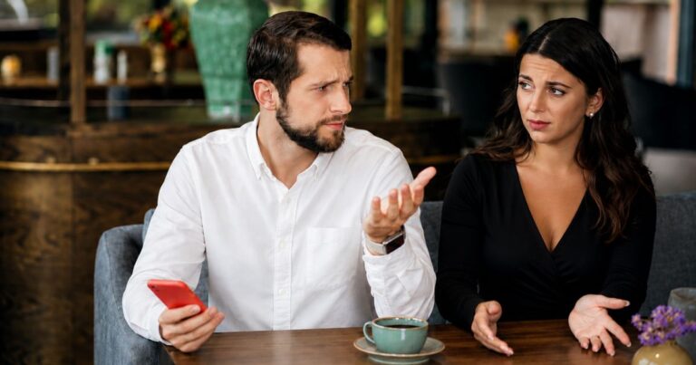 Couple having a serious conversation in a cafe